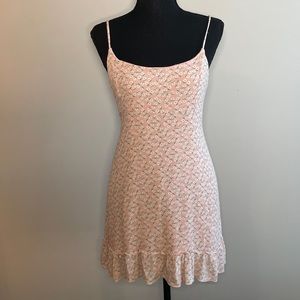 Pink floral dress from the brand Her Entire Name Says Grace in a size medium.